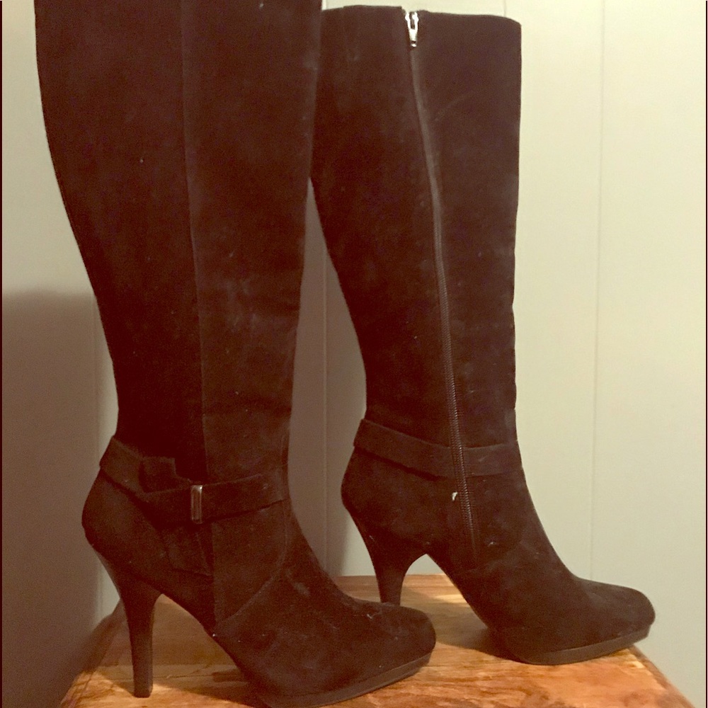 Brand new never worn suede high heel boots.